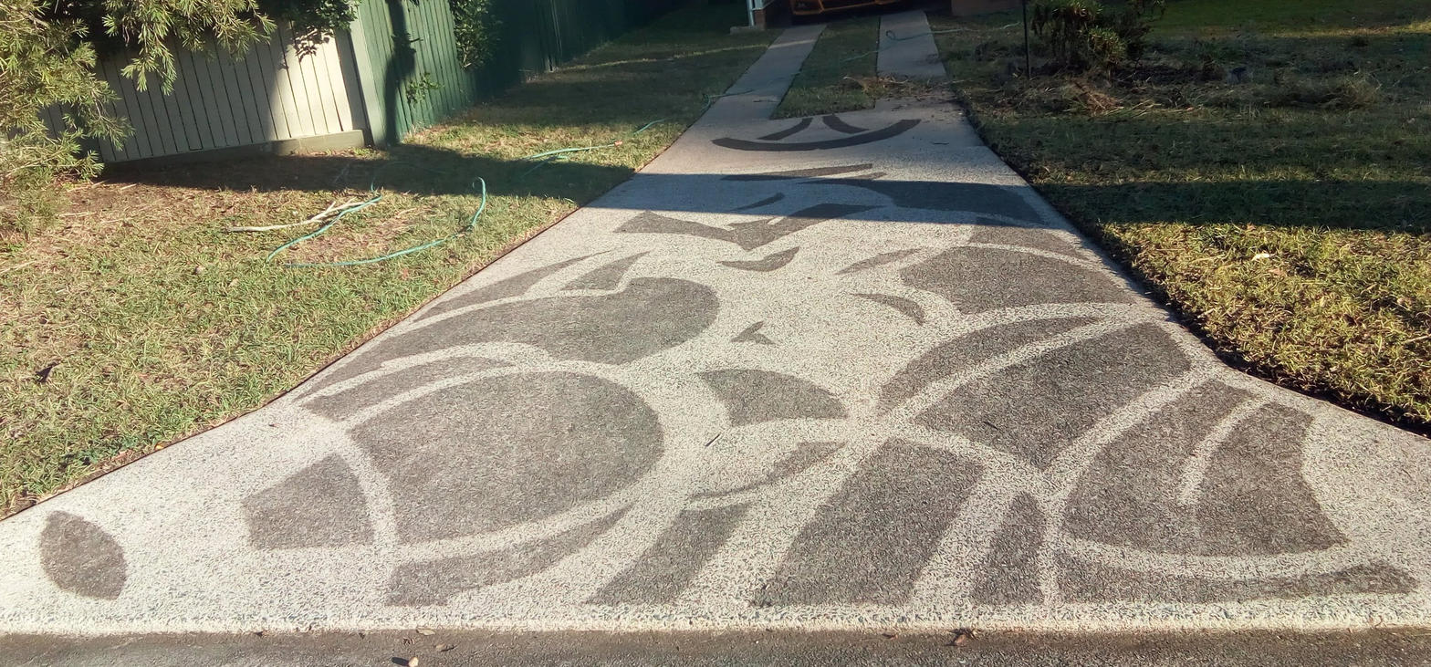 Pressure washing a residential driveway